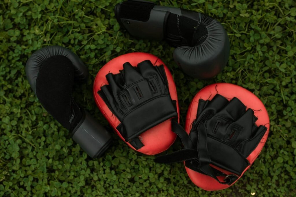 Beginners boing pads and gloves on the ground