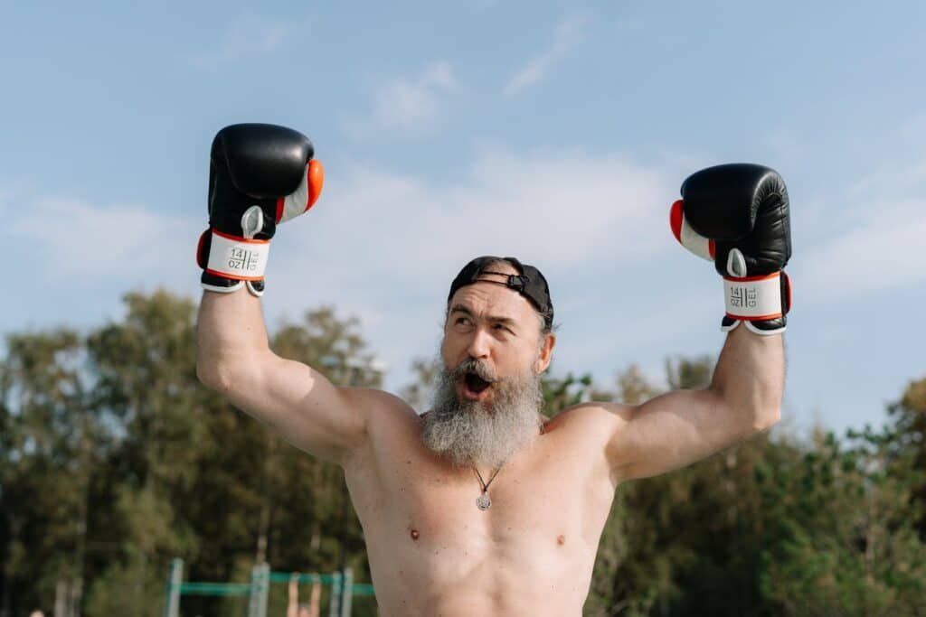 man wearing comfortable and big foam padded boxing gloves