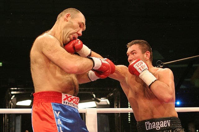 Boxers using modern boxing gloves in a boxing fight