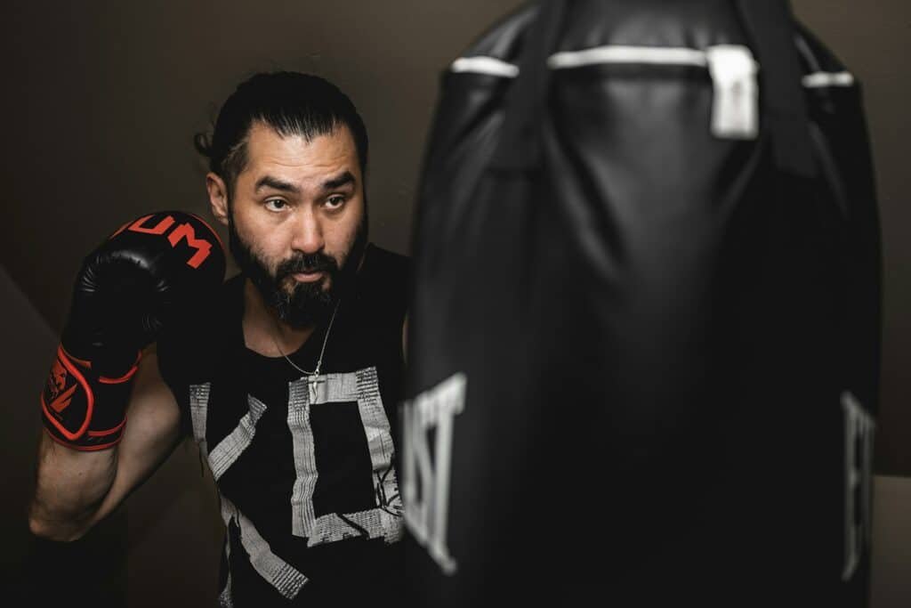 Boxer starting heavy bag training