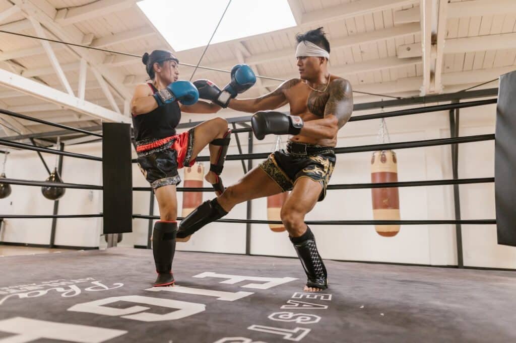 An MMA fight using kicks, which are illegal in boxing
