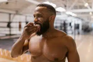Boxer putting in a mouthguard
