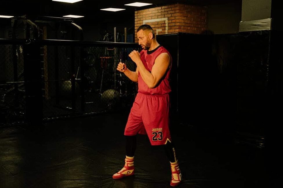 A boxer practising his movement in boxing shoes